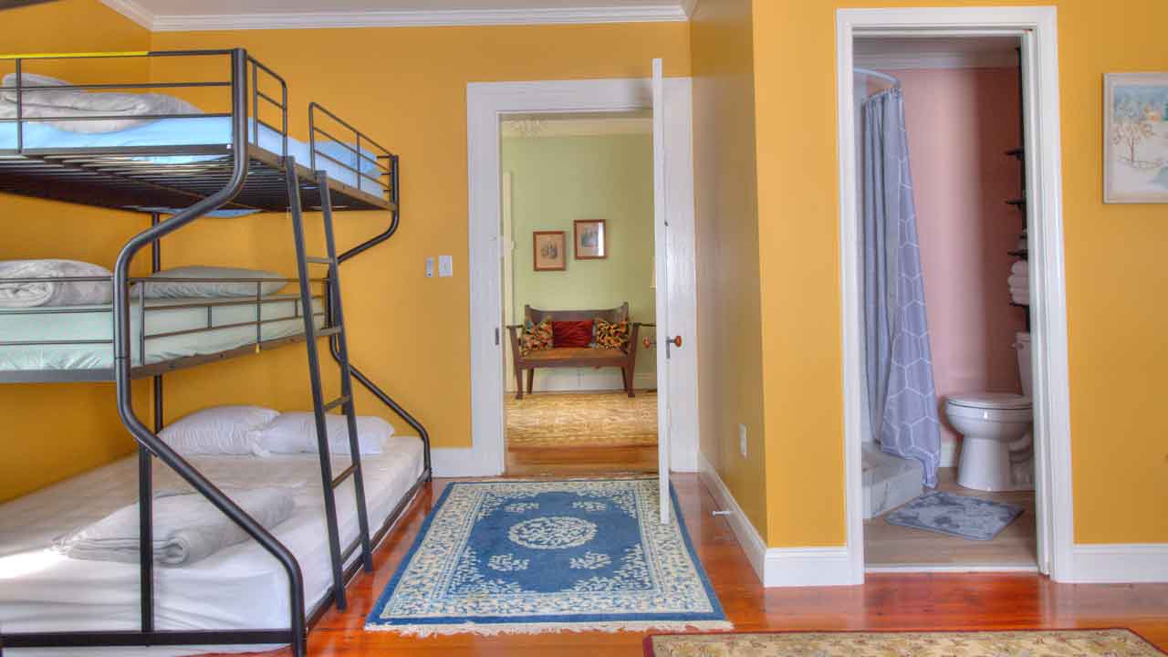 Mickle Knox - Bedroom 4 with bunk beds and bright decor